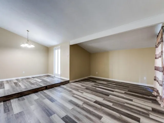 a view of an empty room and window