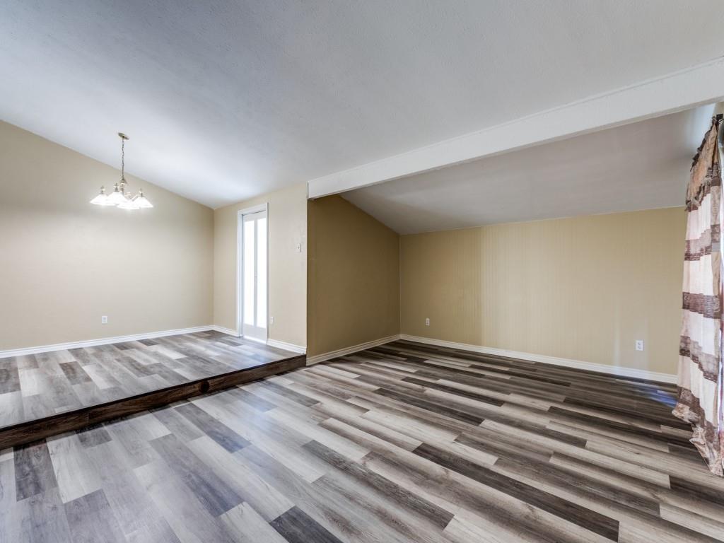 1709 Canadian Trail Plano, TX 75023 - Photo 5 of 12 a view of an empty room and window