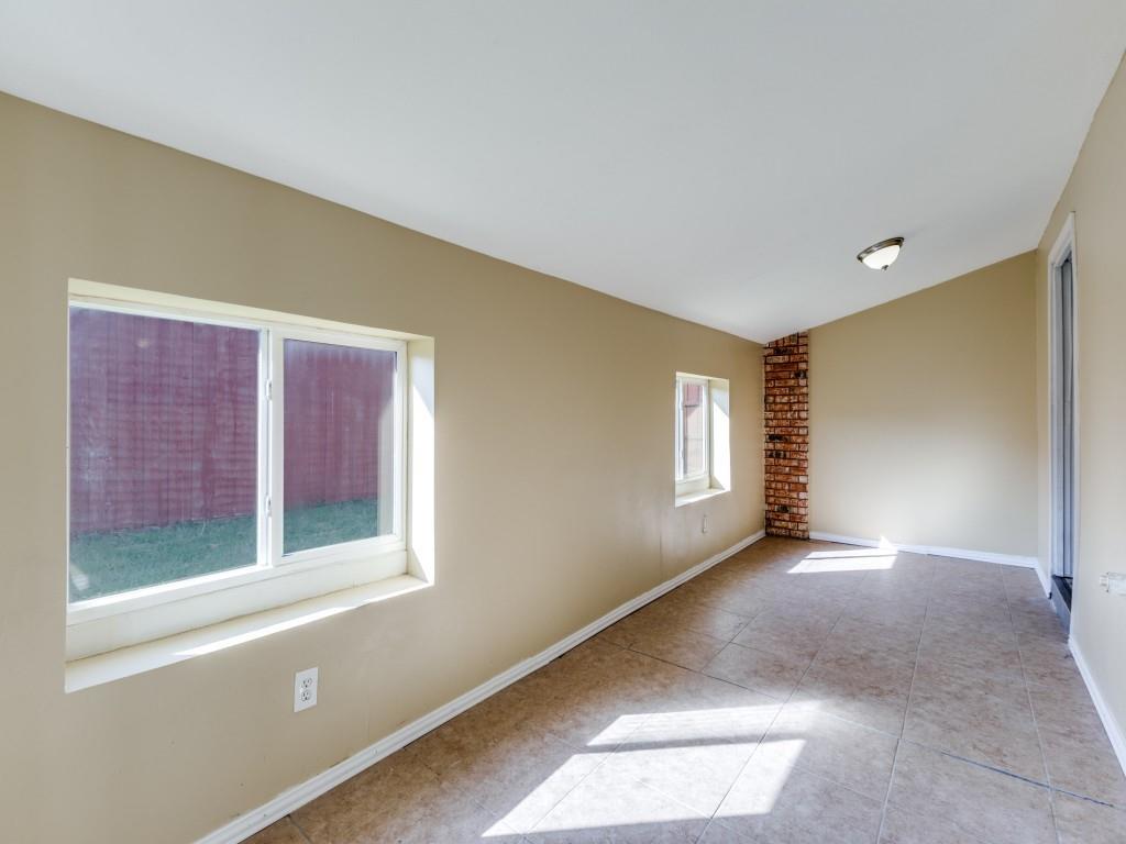1709 Canadian Trail Plano, TX 75023 - Photo 6 of 12 a view of an empty room with a window
