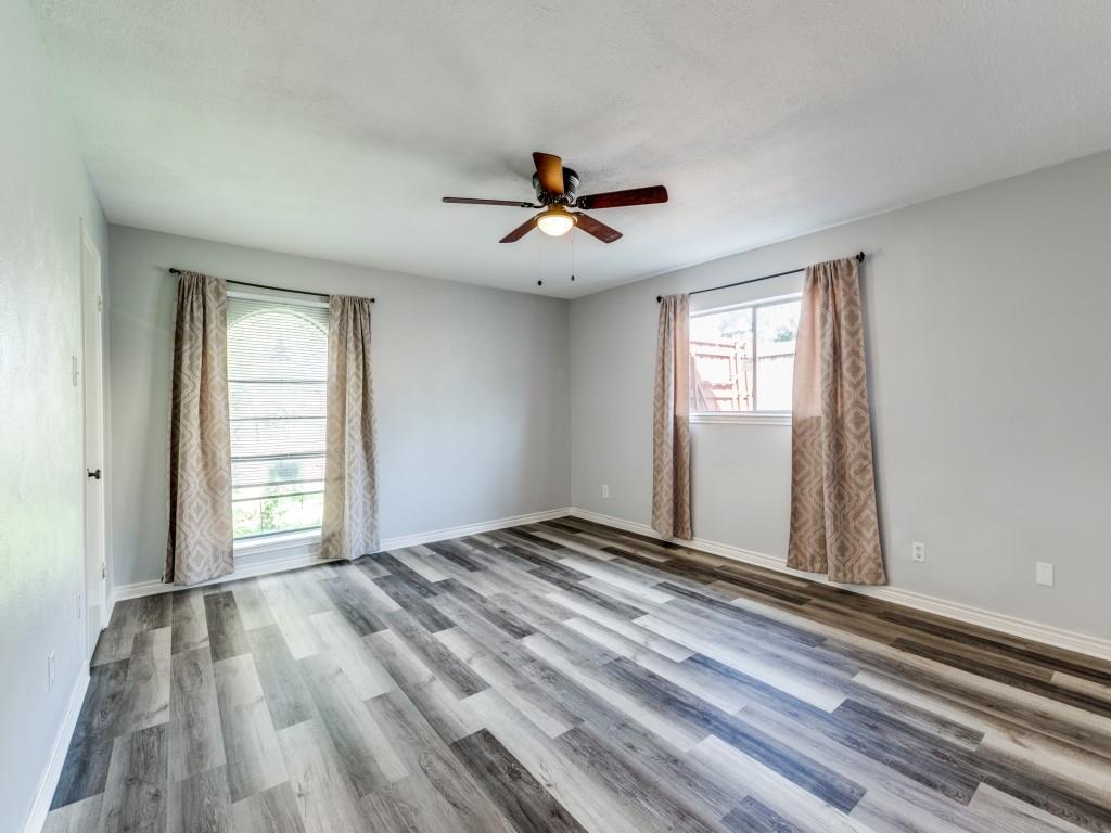 1709 Canadian Trail Plano, TX 75023 - Photo 9 of 12 a view of an empty room with a window