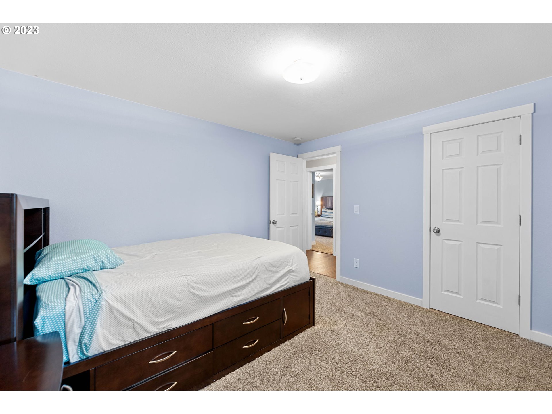 4412 Northeast 292nd Avenue Camas, WA 98607 - Photo 21 of 48 a bedroom with a bed and a dresser