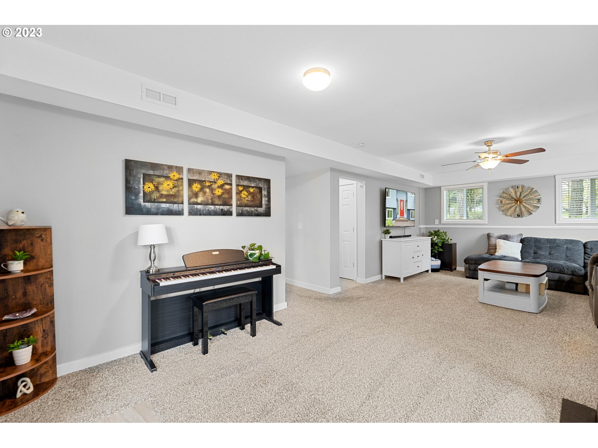 4412 Northeast 292nd Avenue Camas, WA 98607 - Photo 27 of 48 a living room with furniture and a piano