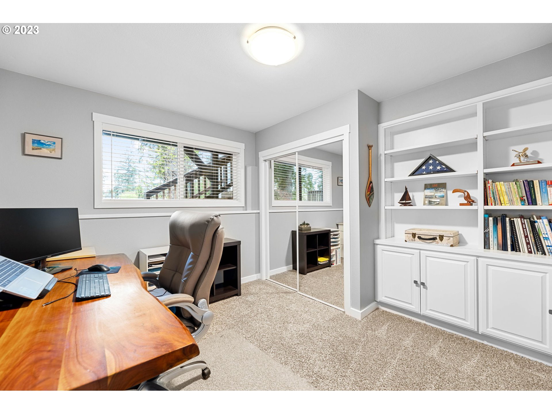 4412 Northeast 292nd Avenue Camas, WA 98607 - Photo 32 of 48 a workspace with a bookshelf