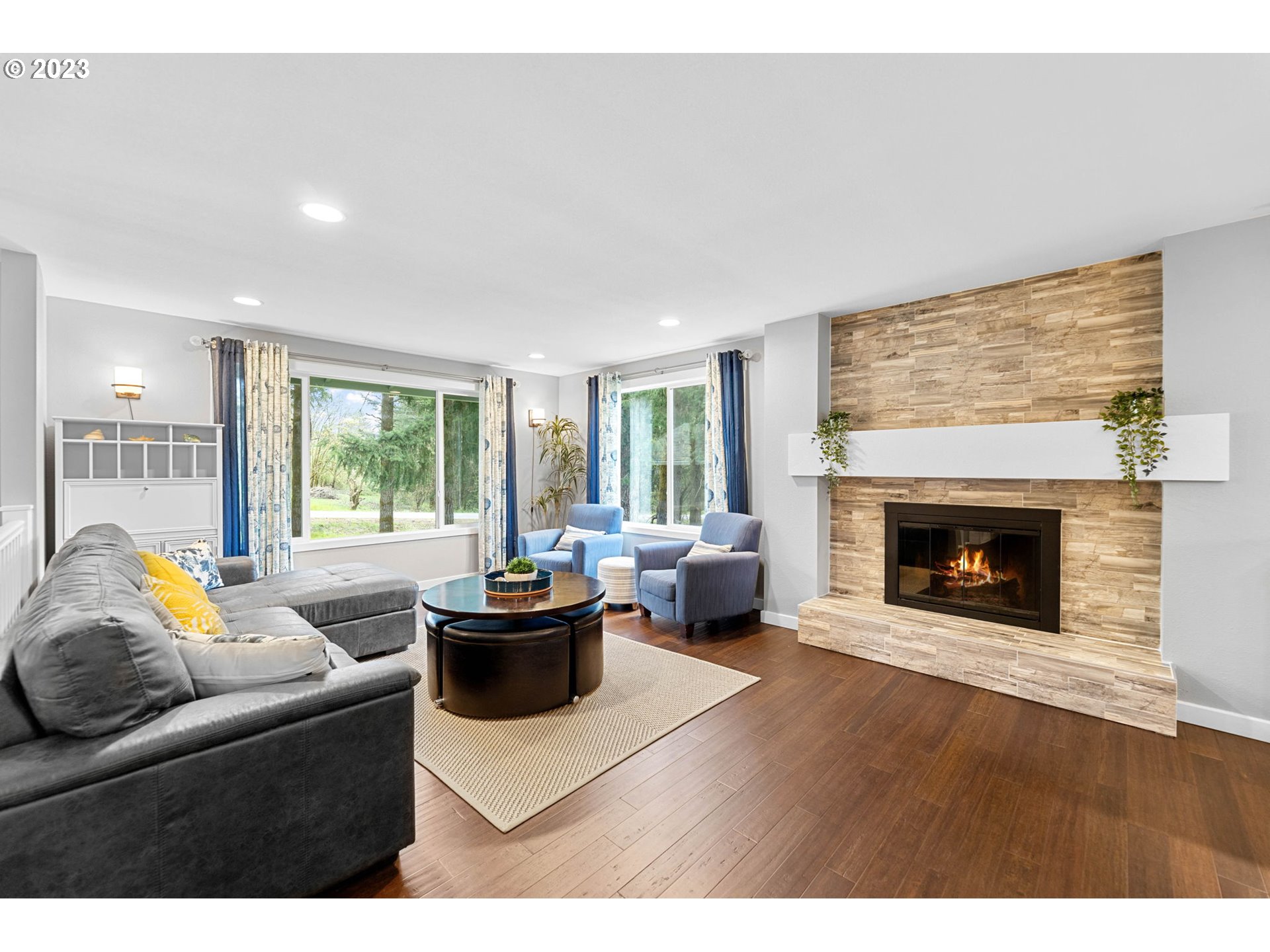 4412 Northeast 292nd Avenue Camas, WA 98607 - Photo 5 of 48 a living room with furniture and a fireplace