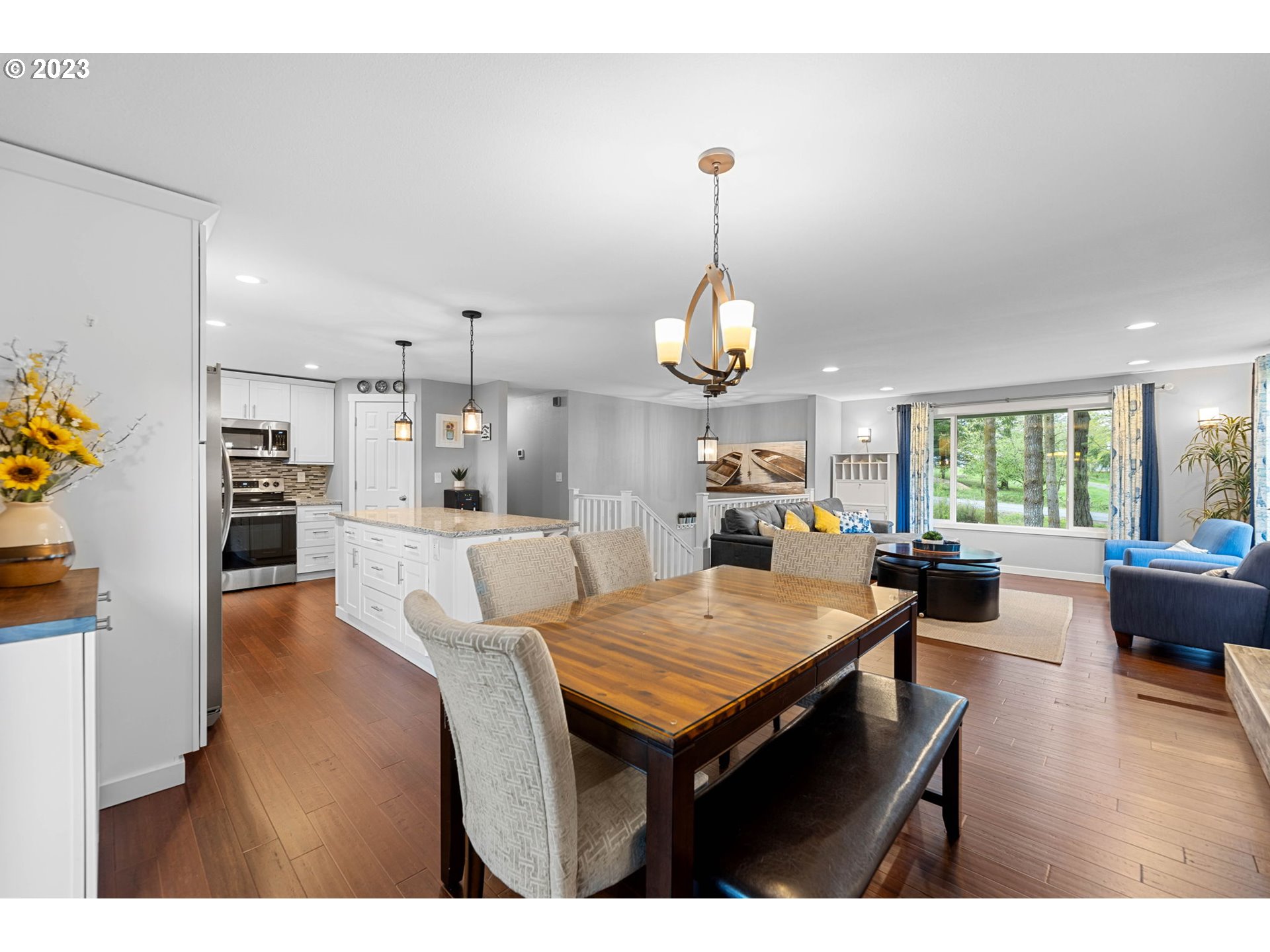4412 Northeast 292nd Avenue Camas, WA 98607 - Photo 8 of 48 a dining room with furniture and wooden floor