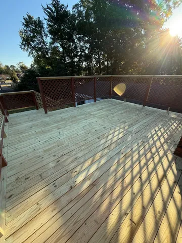 a view of a wooden fence