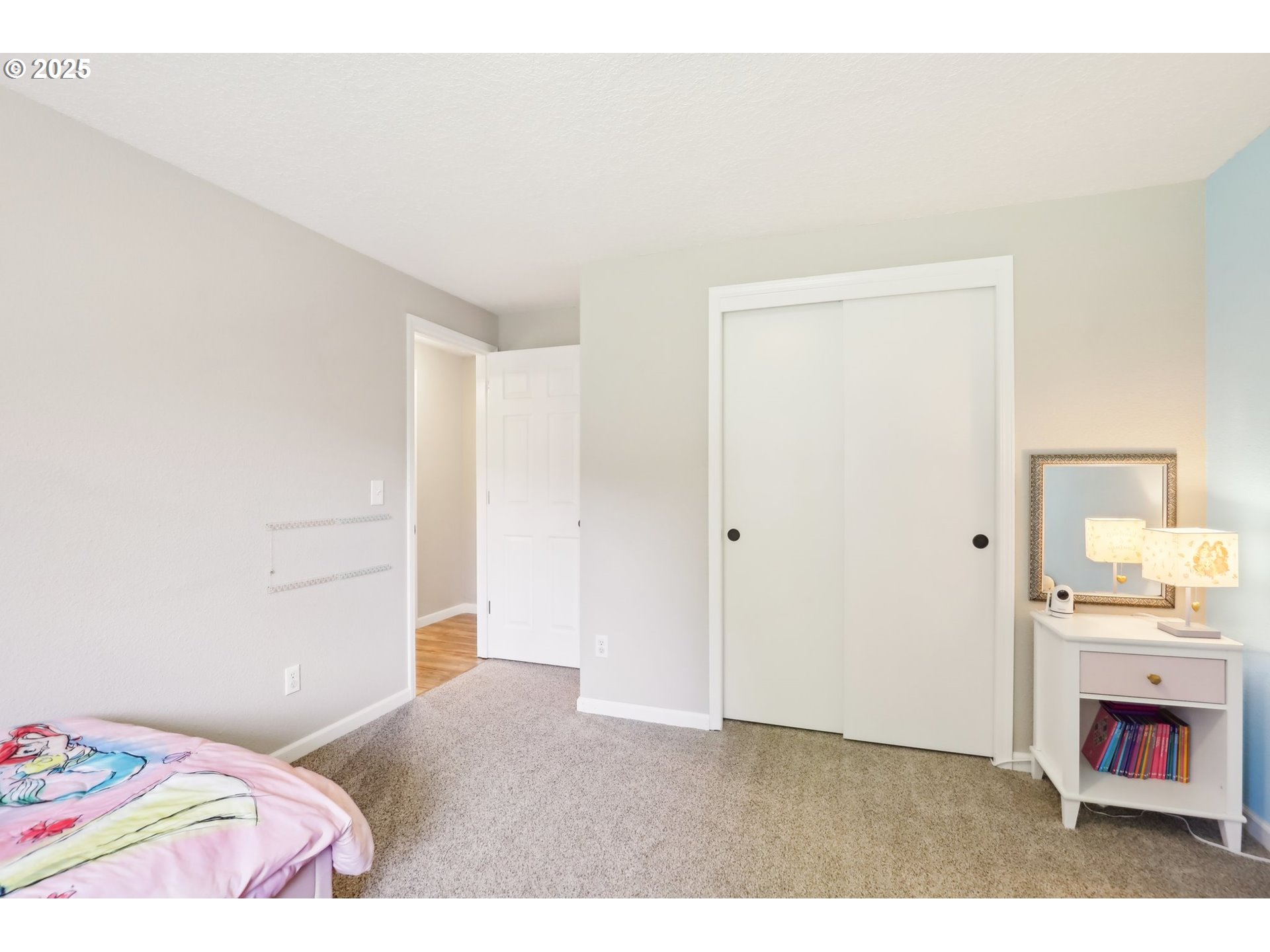 29495 Southwest Yosemite Street Wilsonville, OR 97070 - Photo 22 of 40 a bedroom with a bed and a dresser