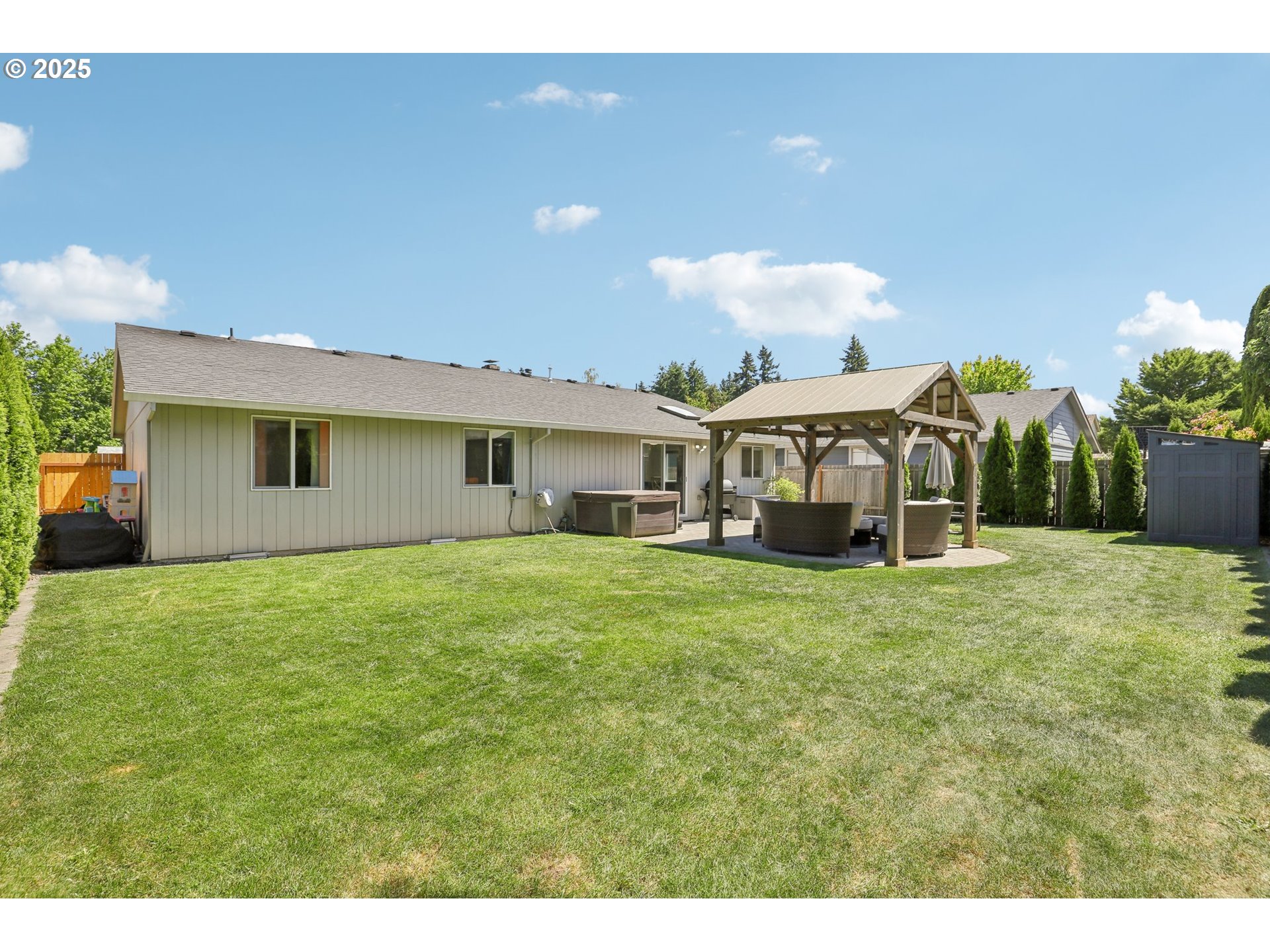 29495 Southwest Yosemite Street Wilsonville, OR 97070 - Photo 33 of 40 a front view of a house with a garden