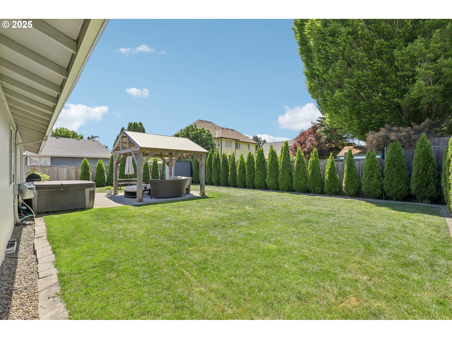 29495 Southwest Yosemite Street Wilsonville, OR 97070 - Photo 35 of 40 a house view with a garden space