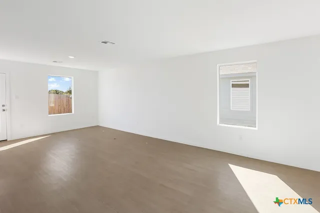 an empty room with a window