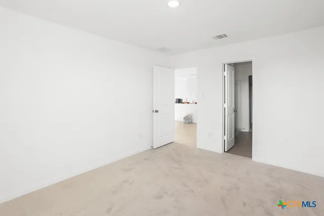 a view of a room with an empty space