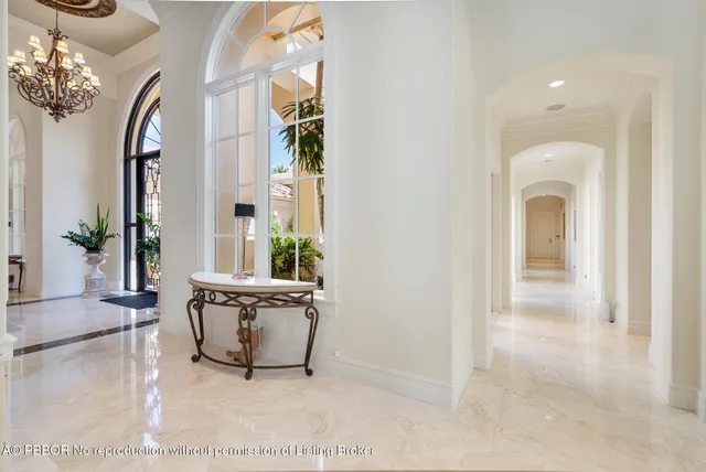 a living room with stainless steel appliances kitchen island granite countertop furniture and a view of living room