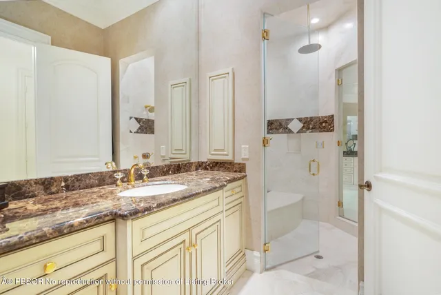 a utility room with sink dryer and washer