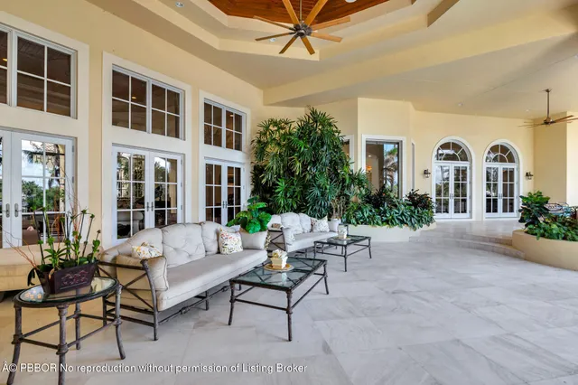 a view of swimming pool with a patio