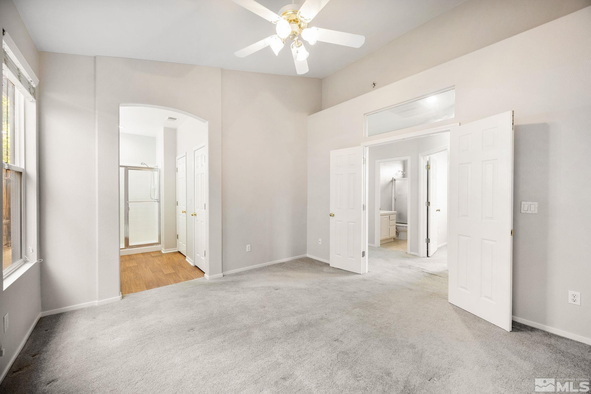 9653 Truckee Meadows Place Reno, NV 89521 - Photo 10 of 22 an empty room with fan and entrance