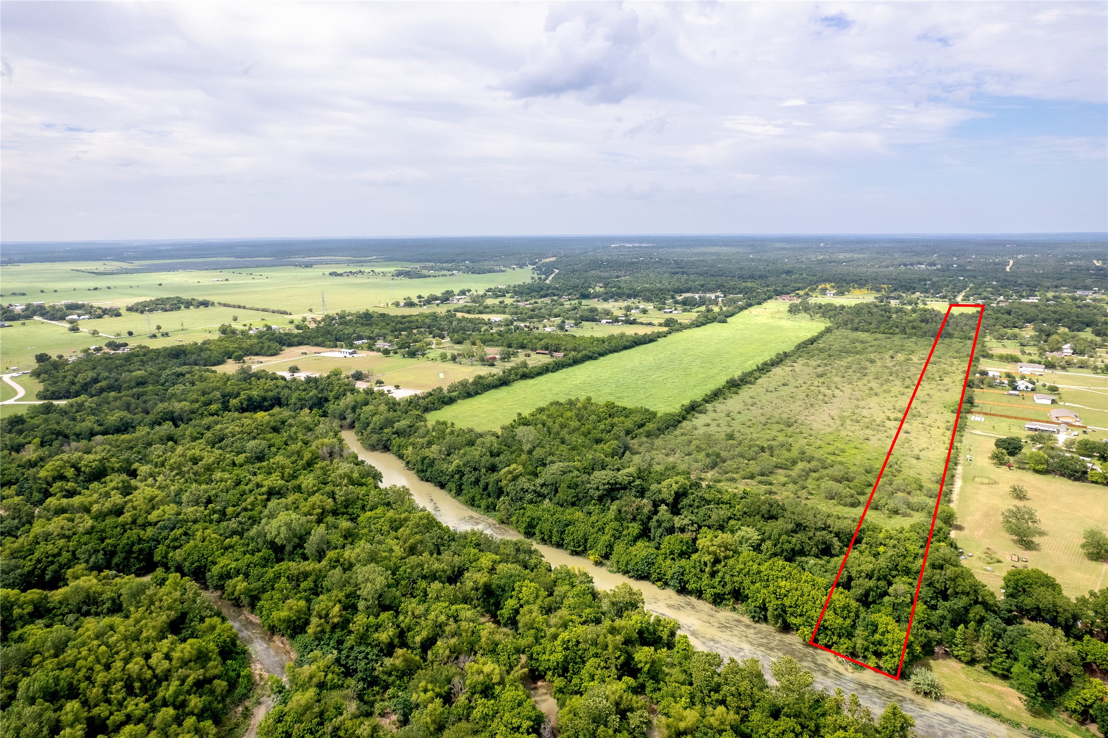 969 Rd Elgin Tx 78602 Road Elgin, TX 78621 - Photo 11 of 17 Overview of rural landscape featuring property boundaries highlighted