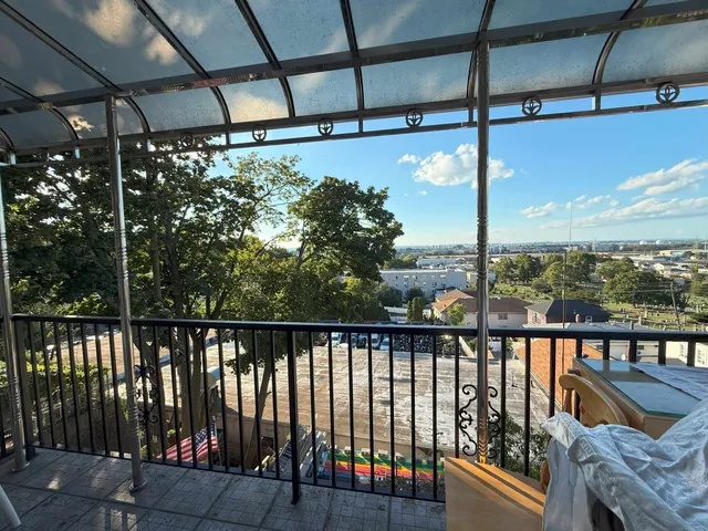 a view of a balcony with lake view
