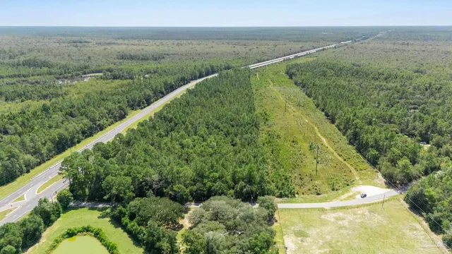 a view of a yard with a garden