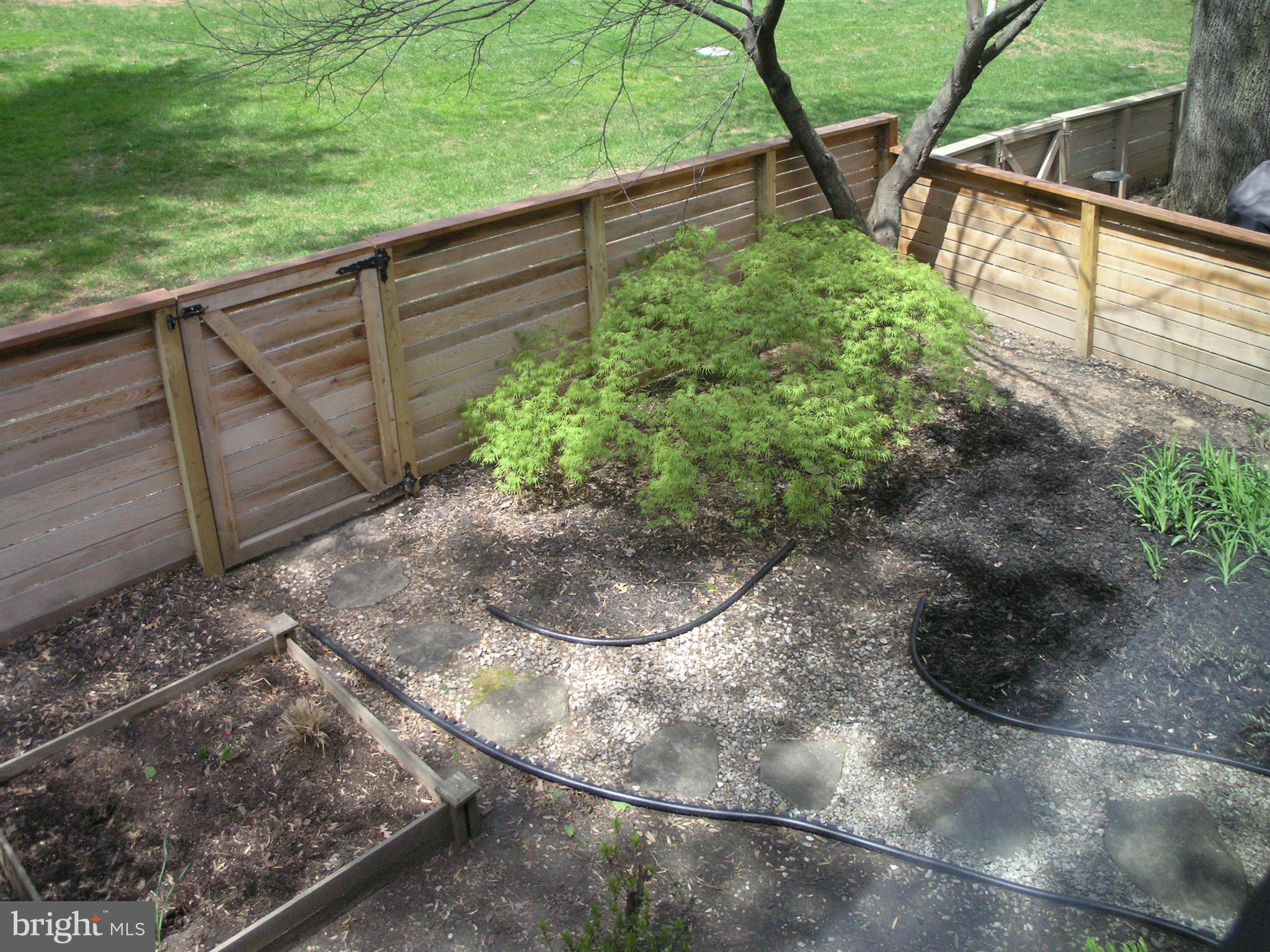 11794 Indian Ridge Road Reston, VA 20191 - Photo 15 of 28 Backyard down from bedrooms