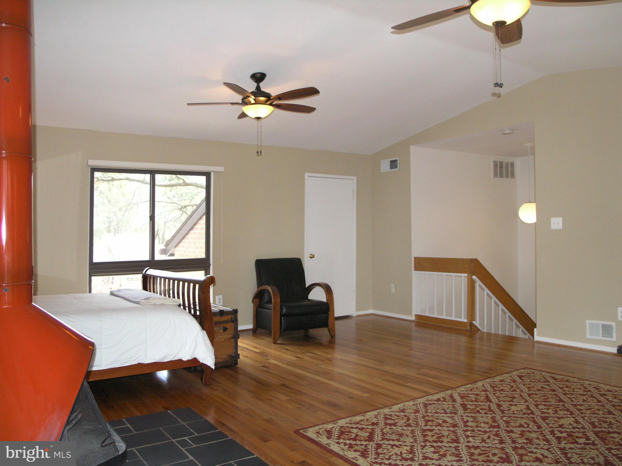 11794 Indian Ridge Road Reston, VA 20191 - Photo 27 of 28 Family Room reverse with Walk-in Attic Storage