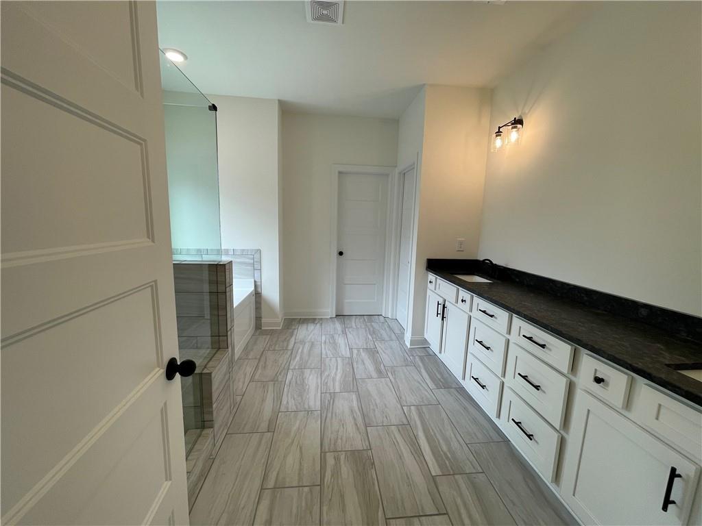 3229 Traditions Way Jefferson, GA 30549 - Photo 26 of 43 a view of a kitchen from the hallway