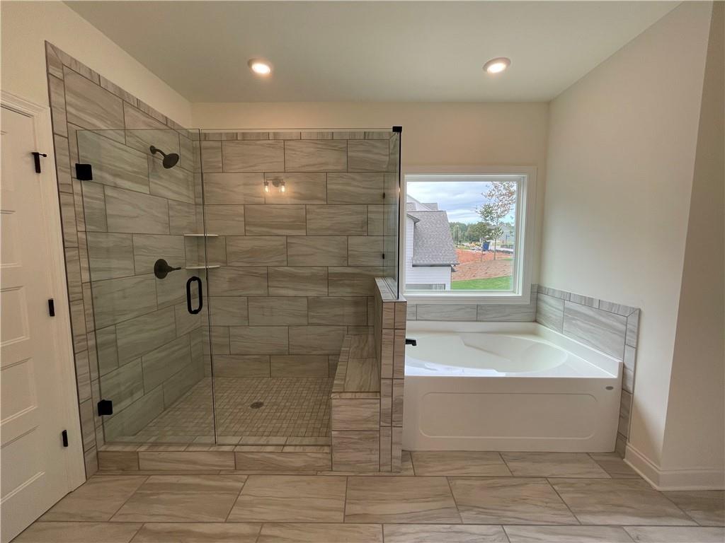 3229 Traditions Way Jefferson, GA 30549 - Photo 27 of 43 a bathroom with a shower