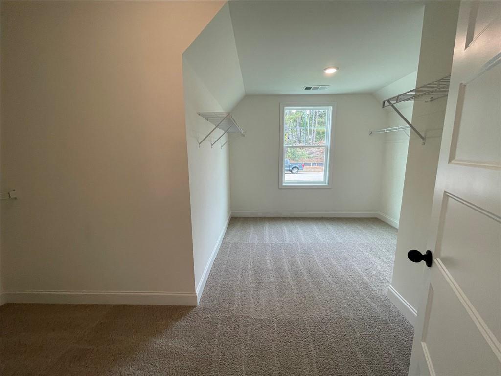 3229 Traditions Way Jefferson, GA 30549 - Photo 28 of 43 a view of room with window and hardwood floor