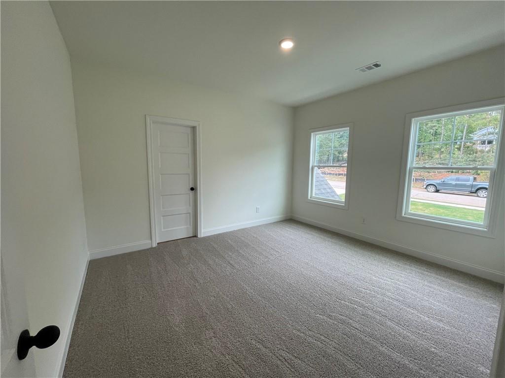 3229 Traditions Way Jefferson, GA 30549 - Photo 30 of 43 an empty room with windows