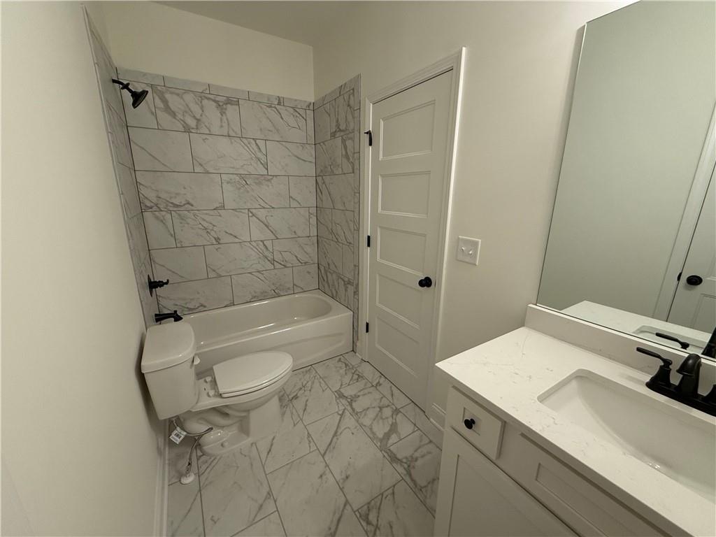 3229 Traditions Way Jefferson, GA 30549 - Photo 31 of 43 a bathroom with a sink toilet and shower