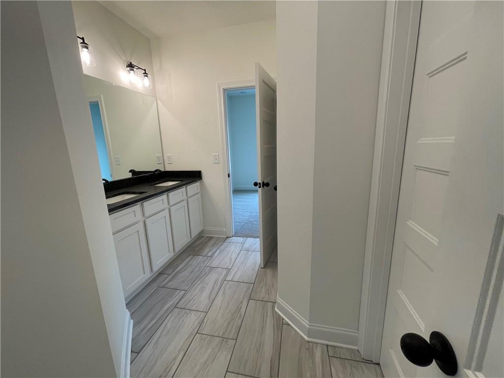 3229 Traditions Way Jefferson, GA 30549 - Photo 36 of 43 a view of a kitchen from the hallway