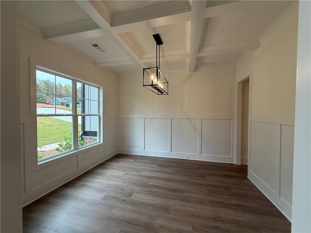 3229 Traditions Way Jefferson, GA 30549 - Photo 8 of 43 a view of an empty room with wooden floor and a window