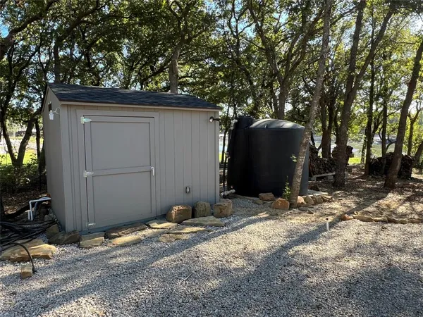 a view of a balcony with lake view