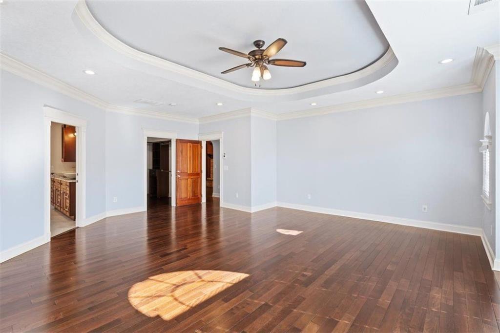 142 Nelson Boulevard Northwest Rome, GA 30165 - Photo 28 of 81 a view of livingroom with hardwood floor and ceiling fan
