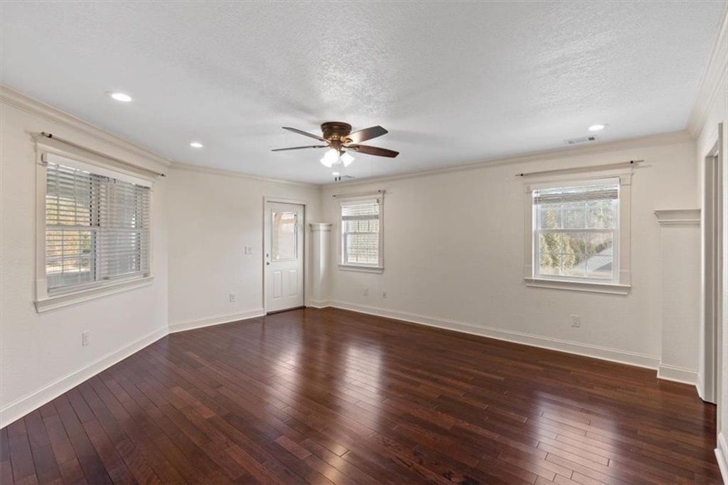 142 Nelson Boulevard Northwest Rome, GA 30165 - Photo 38 of 81 a view of an empty room with a window and wooden floor