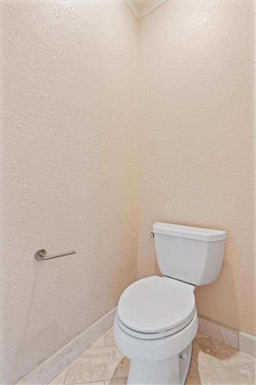142 Nelson Boulevard Northwest Rome, GA 30165 - Photo 51 of 81 a white toilet sitting next to a white wall