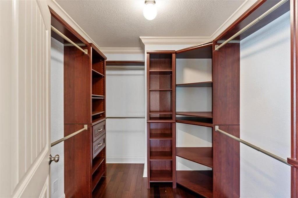 142 Nelson Boulevard Northwest Rome, GA 30165 - Photo 54 of 81 a view of walk in closet with wooden floor