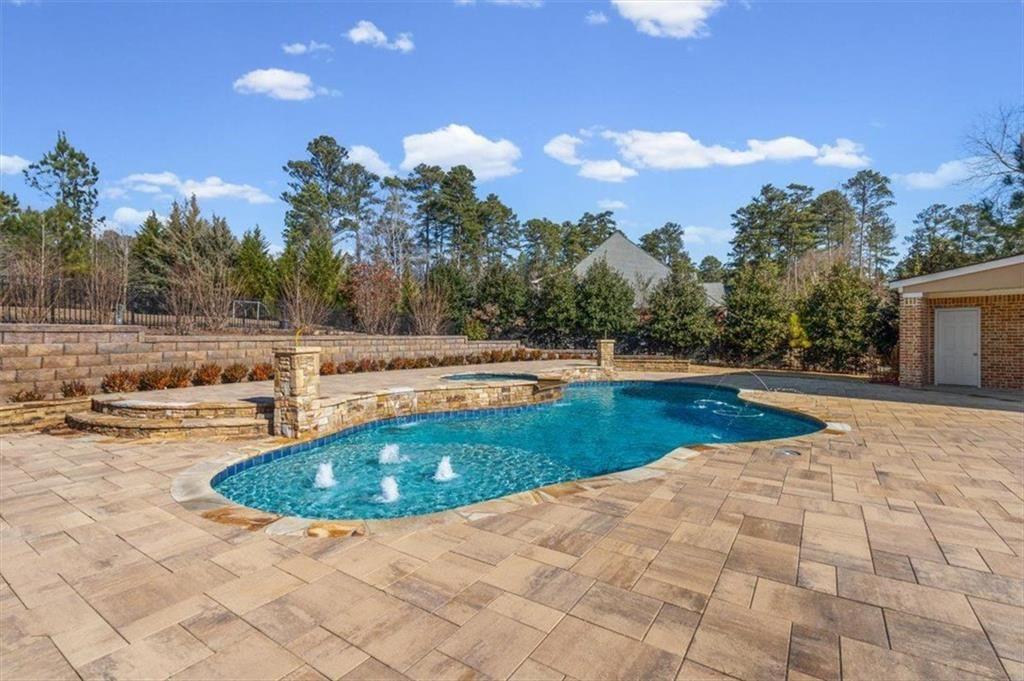142 Nelson Boulevard Northwest Rome, GA 30165 - Photo 68 of 81 a view of a swimming pool with an outdoor space and seating area