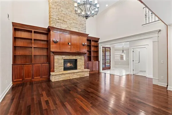 a kitchen with stainless steel appliances granite countertop a stove sink and cabinets