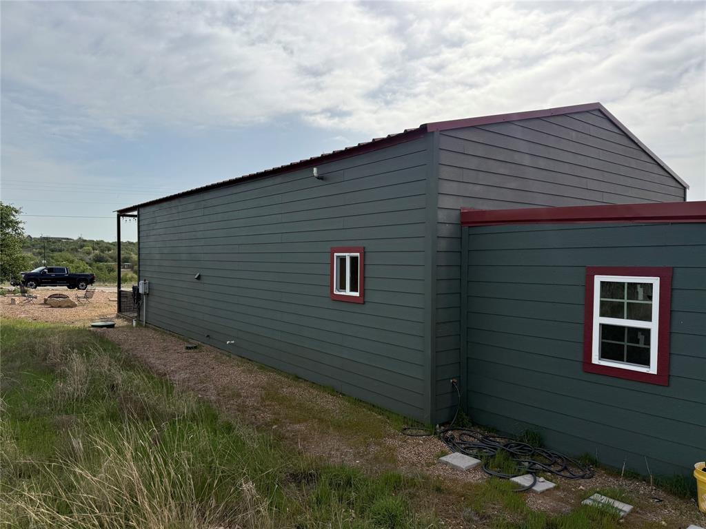 8072 Hells Gate Loop Strawn, TX 76475 - Photo 5 of 16 a view of backyard of house
