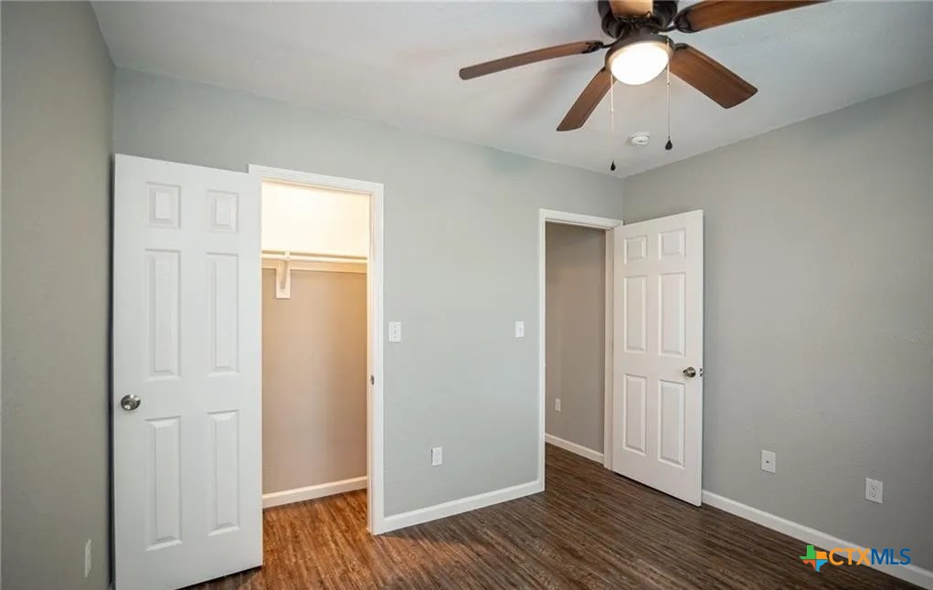 2003 Woodlawn Street Victoria, TX 77901 - Photo 31 of 35 wooden floor in an empty room with a window
