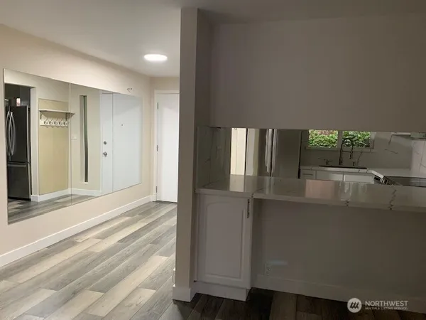 a view of balcony and kitchen