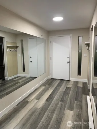 a view of a bedroom from a hallway