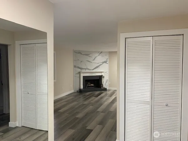 a view of a livingroom with a fireplace