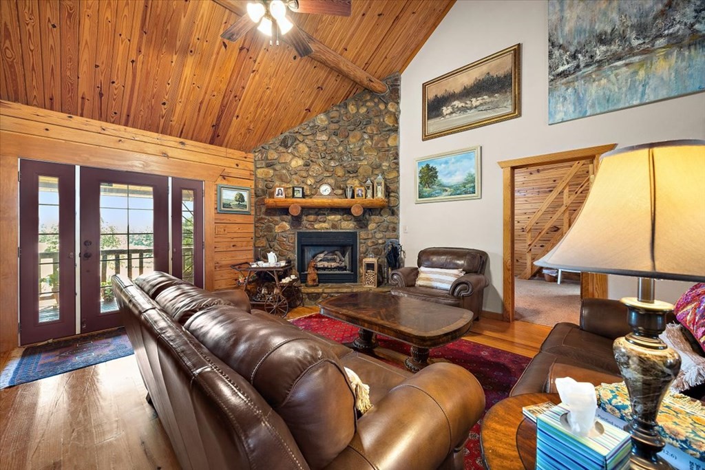 2000 County Road 852 Cushing, TX 75760 - Photo 13 of 50 a living room with furniture fireplace and a flat screen tv