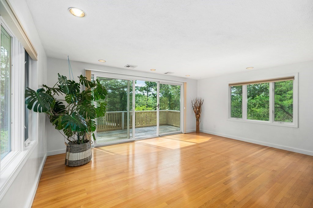2 Moses Hill Road Manchester, MA 01944 - Photo 14 of 30 a view of a room with wooden floor and a potted plant