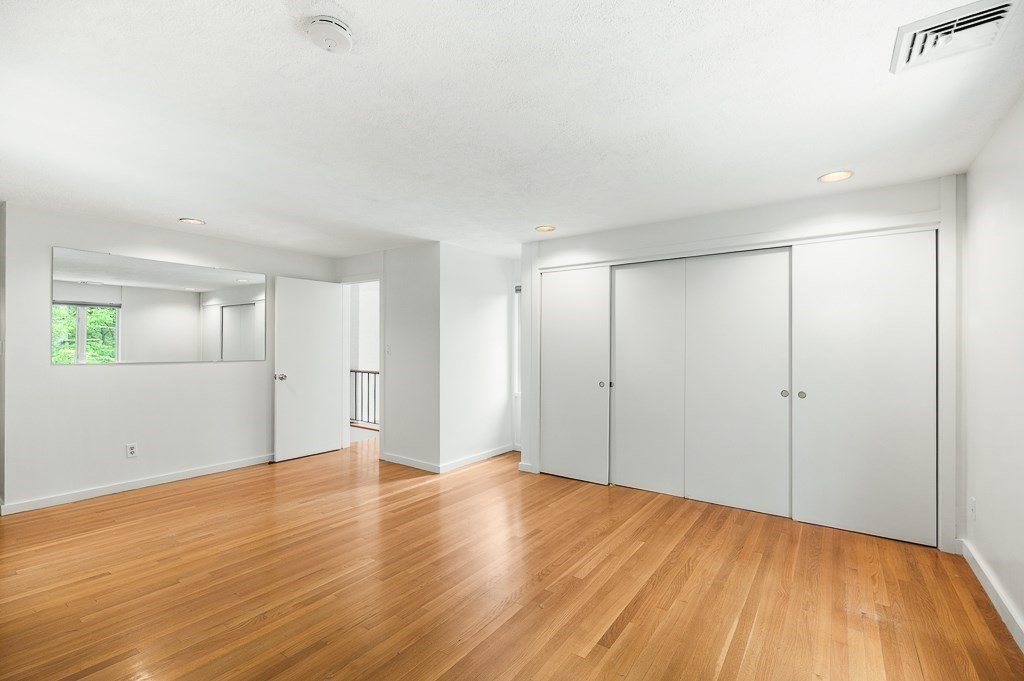 2 Moses Hill Road Manchester, MA 01944 - Photo 16 of 30 a view of an empty room with wooden floor