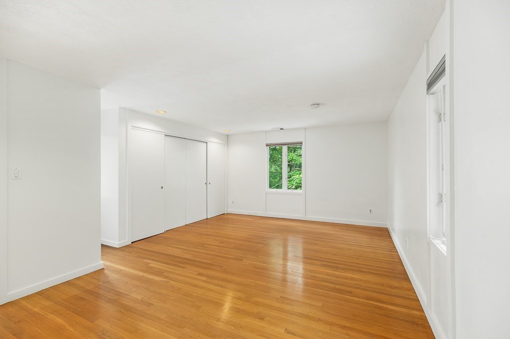 2 Moses Hill Road Manchester, MA 01944 - Photo 17 of 30 a view of empty room with wooden floor