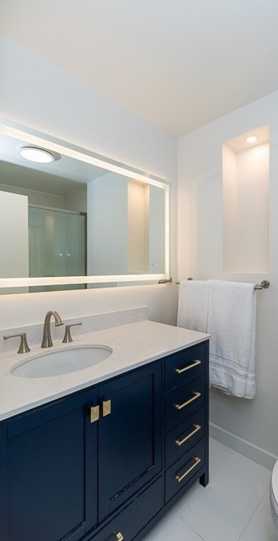 2 Moses Hill Road Manchester, MA 01944 - Photo 18 of 30 a bathroom with a sink and a mirror