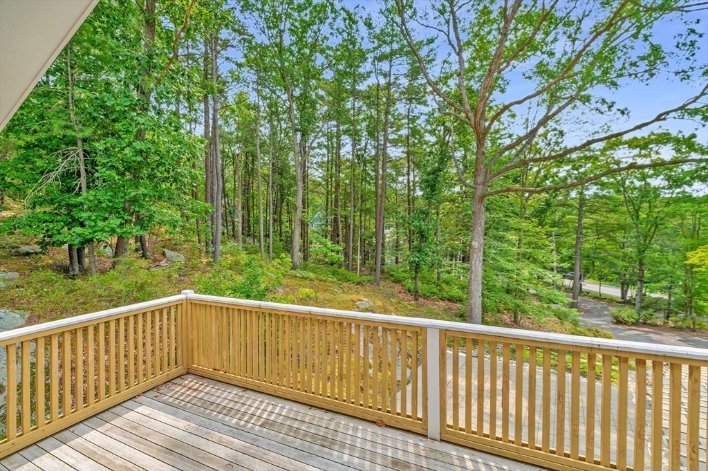 2 Moses Hill Road Manchester, MA 01944 - Photo 23 of 30 a view of balcony with deck and trees