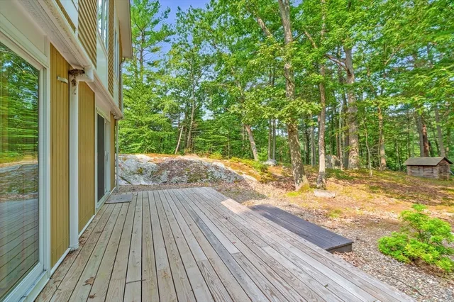 a view of a backyard of the house